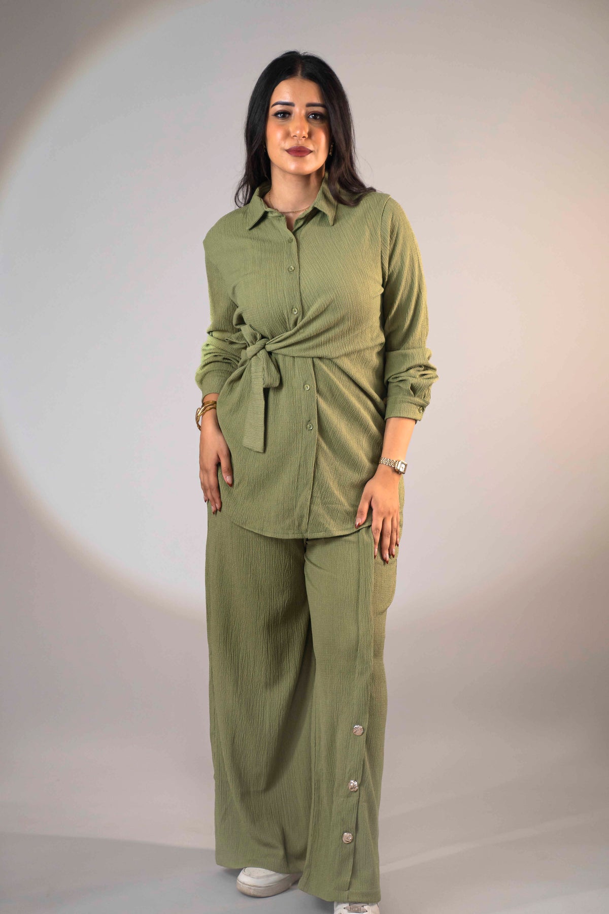 Olive green suit with a side-tie design